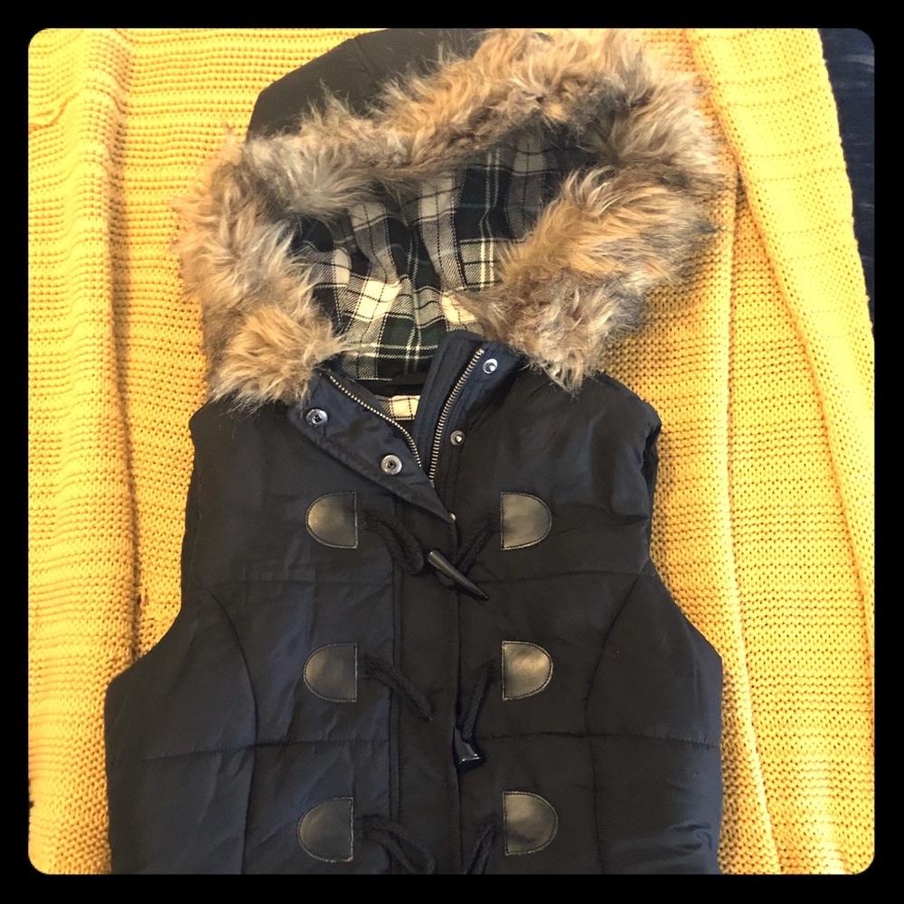 Black vest with faux fur removal hood